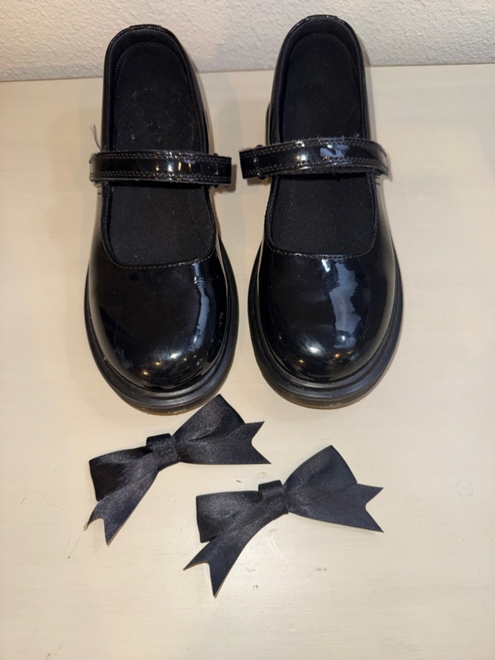 Dr. Martens Black Patent Mary Jane Shoes with Black Bows